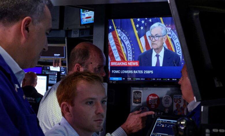 Stock market records, Fed rate cut, trades, and new iPhones