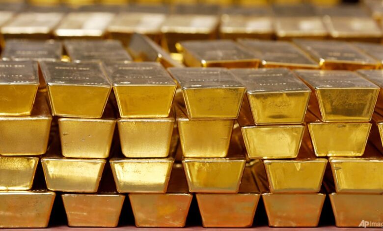 Global stocks mostly fall on lacklustre results from Netflix, others; gold tumbles again