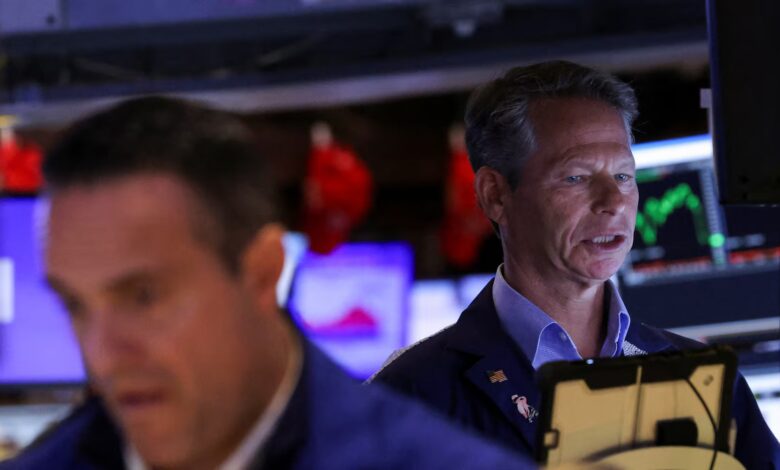 Stocks mixed, gold hits record as US government shuts down