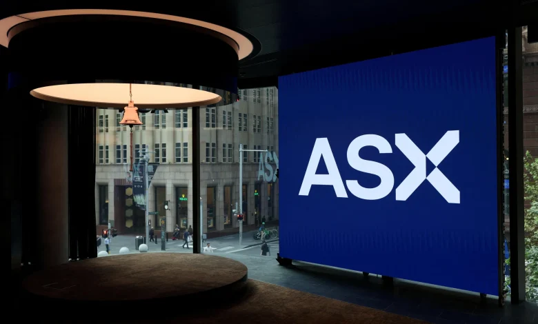 Australian shares decline nearly 1% as BHP warning, rate fears hit miners, banks