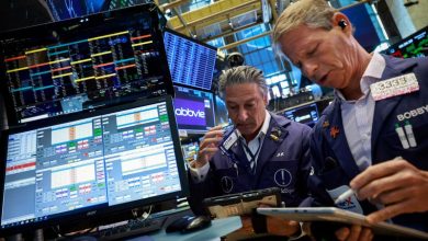 Dow hits record high as oil slides; SpaceX soars