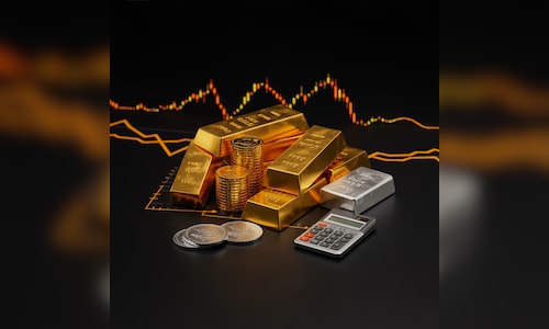 Gold falls nearly 1%, silver tumbles over 2% in futures trade