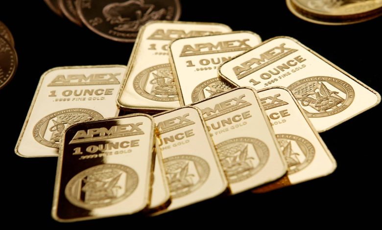 Gold hits two-week high as Fed outlook, Mideast conflict stay in focus