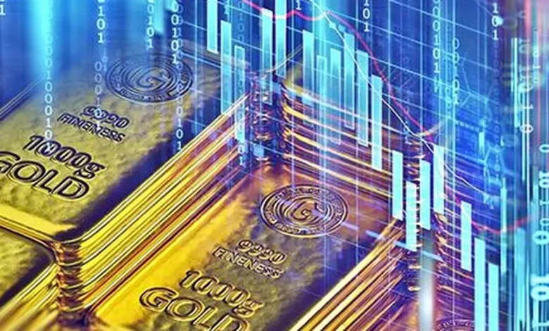 Gold rises from two-week low ahead of US inflation data