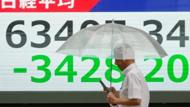 Asian shares sink, with Tokyo down nearly 5% as slumping AI stocks drag world markets lower