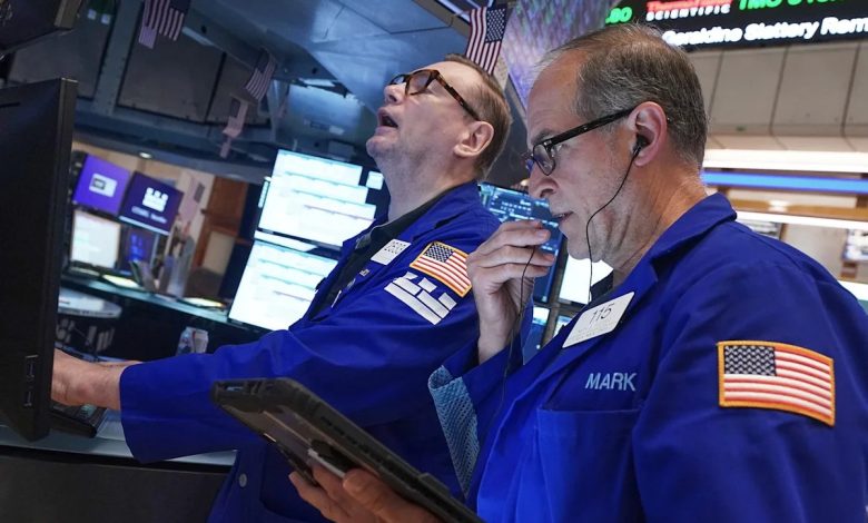 Most US stocks rise, but drops for tech keep Wall Street in check